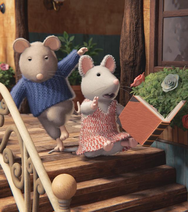  Julia sitzt auf der obersten Treppenstufe der Eingangstreppe des Mäusehauses. Hinter ihr ist Sam auf ihren Schwanz getreten, so dass Julia vor Schreck das Buch aus der Hand gerutscht ist und sich gerade im freien Fall befindet.  Julia schaut erschrocken, Sam sieht verwundert aus. Ein helles Geländer befindet sich auf der Seite der Treppe. Blumenkästen hängen am Geländer und neben dem Hauseingang.