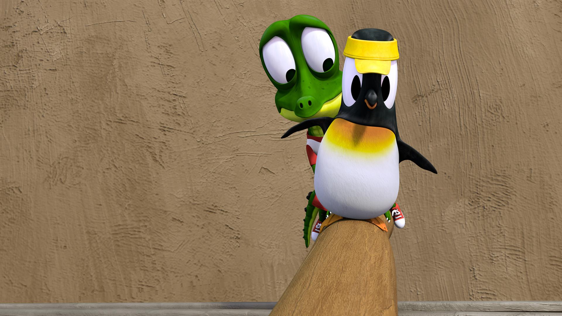 Pinguin Anni balanciert sicher über einen Holzstamm, Krokodil Zacki ist hinter ihr und sieht sehr verängstigt aus.