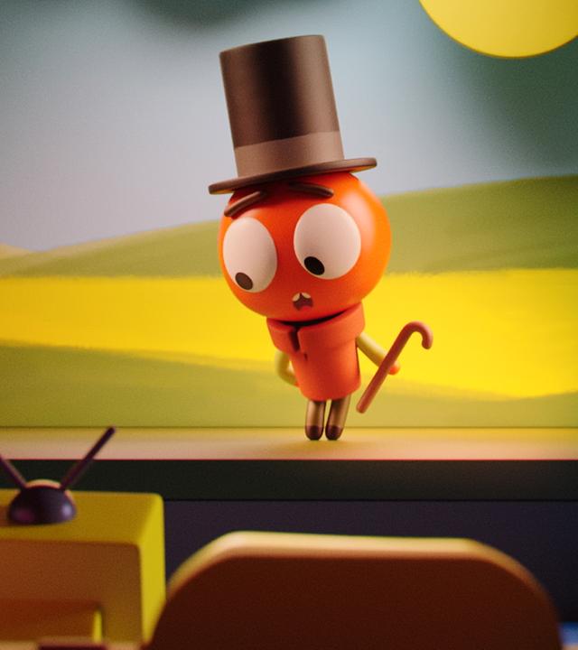 Tomaten-Junge Heinz steht mit erschrockenem Blick auf der Bühne. Er trägt einen Zylinder und hält eine Gehstock in einer Hand. Der Bühnenhintergrund aus Pappe illustriert einen Bauernhof mit einer Wiese, Büschen, einer Sonne und Wolken. Das Publikum schaut Richtung Bühne zu Heinz.