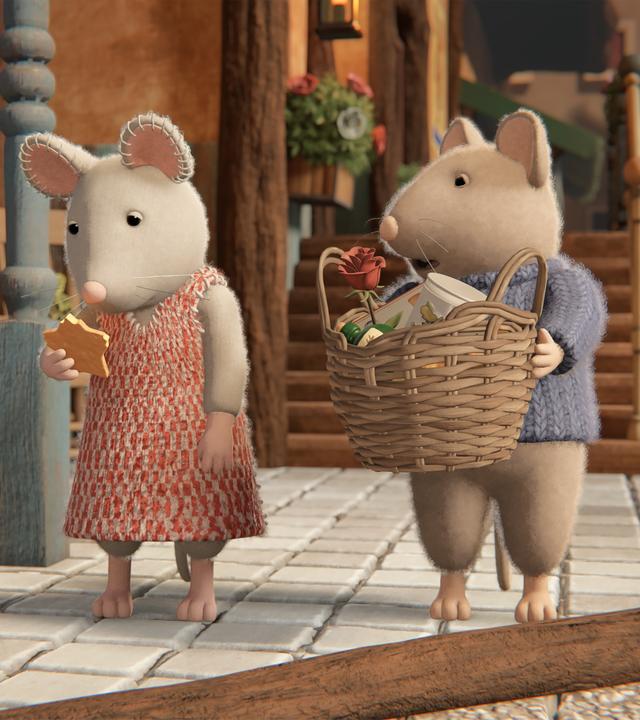 Julia schaut schuldbewusst auf den Käsestern in ihrer rechten Hand, dem eine kleine Ecke fehlt. Sam steht neben ihr und hat einen großen geflochtenen Korb in den Händen. Er sieht irritiert zu Julia. Die beiden stehen im Eingangsbereich des Mäusehauses. Links sind Topfpflanzen, im Hintergrund Holztreppen zu sehen.