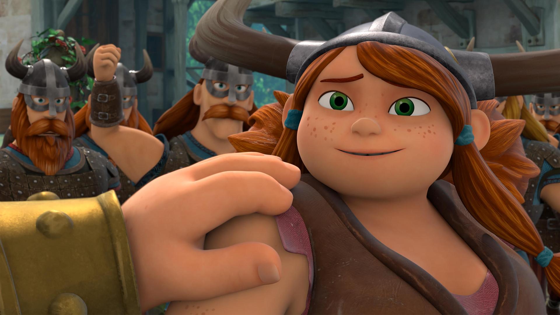 Innerhalb des Lagers umjubelt das Wikingervolk seine Heldin Herfrid. Sie steht in deren Mitte und blickt leicht errötet und ergriffen zu Harlald, von dem nur seine Hand und der stählerne Armschutz abgebildet ist. Seine Hand ruht ehrend auf Herfrids Schulter.