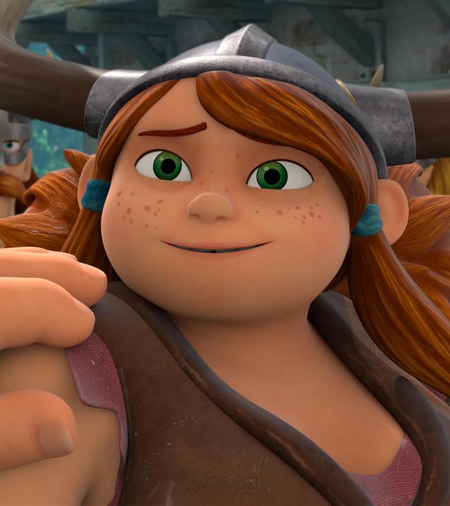 Innerhalb des Lagers umjubelt das Wikingervolk seine Heldin Herfrid. Sie steht in deren Mitte und blickt leicht errötet und ergriffen zu Harlald, von dem nur seine Hand und der stählerne Armschutz abgebildet ist. Seine Hand ruht ehrend auf Herfrids Schulter.