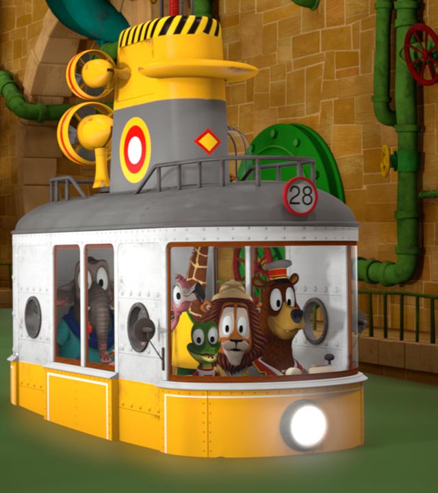 Die Zoobande sitzt in ihrer Bahn, welche durch das Wasser im Tunnelsystem fährt.