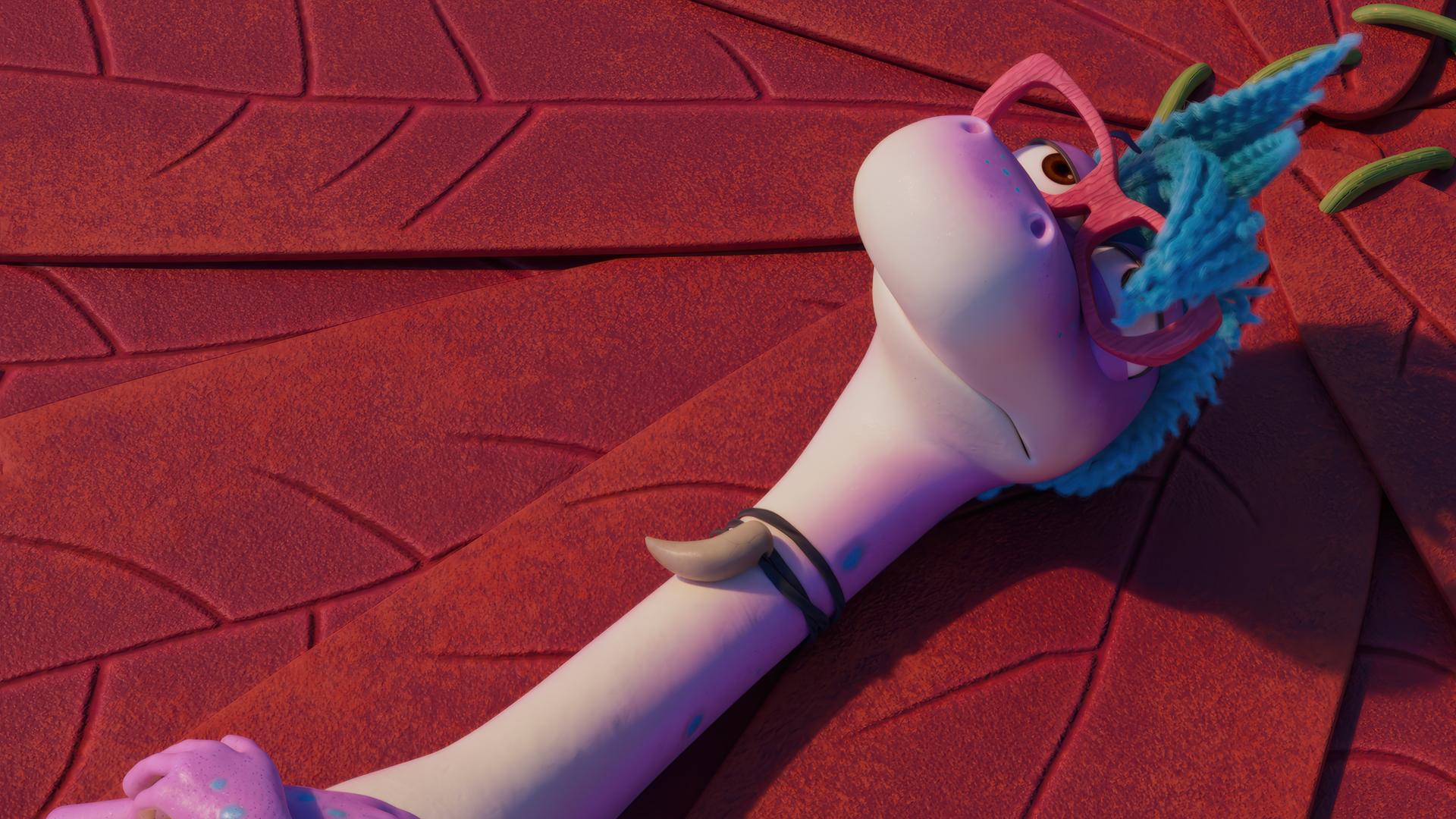 Magma, das lilafarbene Dinosauriermädchen mit Brille und blauen Haaren liegt auf einem blattartigen Trampolin und blickt gelangweilt in den Himmel.