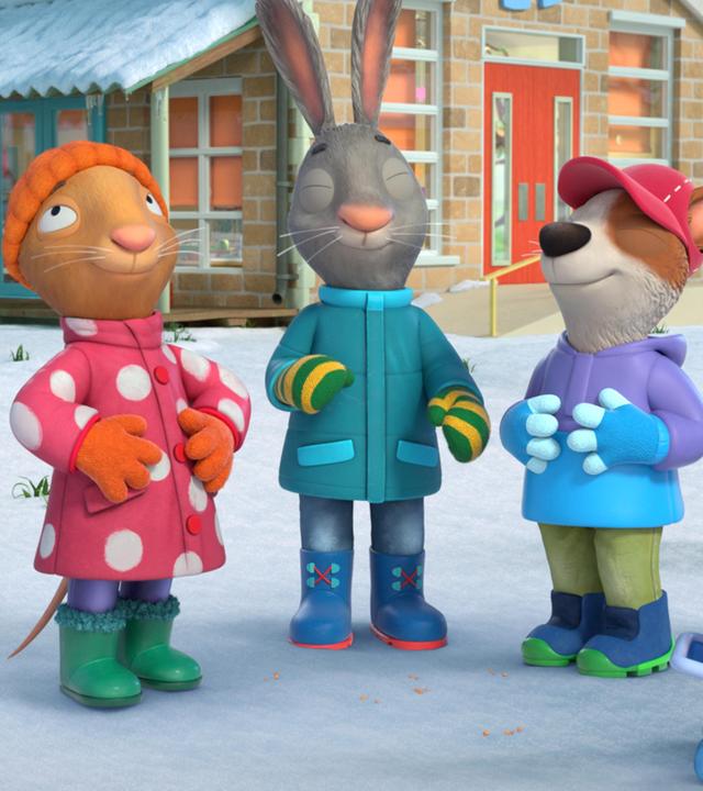 Im schneebedeckten Garten vor dem Haus stehen, warm angezogen, die drei Freunde Posy, die Maus, Pip, das Kaninchen und Zac, der Hund. Sie reiben sich die Bäuche. Pip und Zac haben glücklich und genießerisch die Augen geschlossen, und Posy blickt mit verklärtem Blick nach oben.