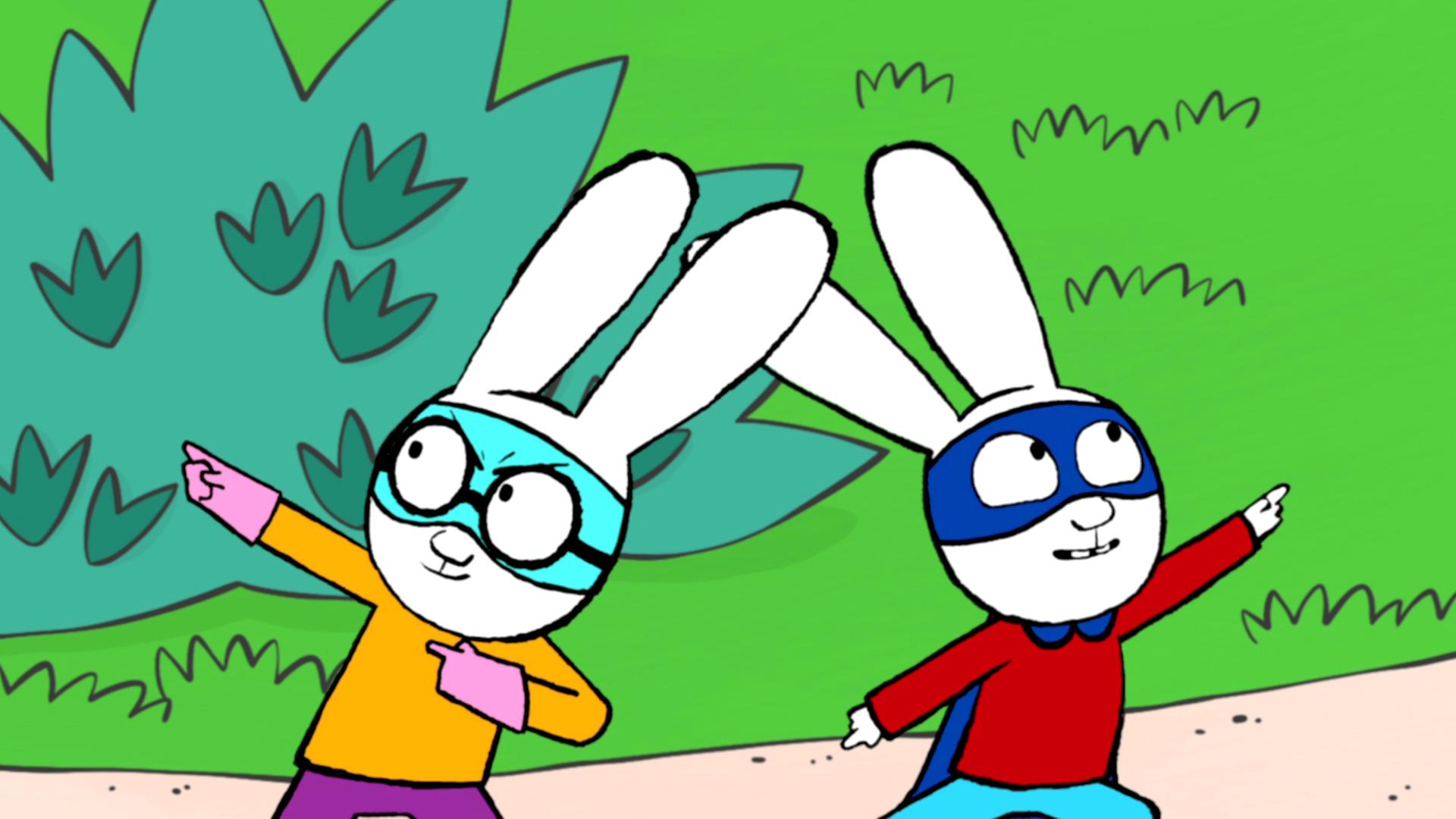 Ferdinand und Simon, als Superhelden verkleidet, posieren energiegeladen im Park.