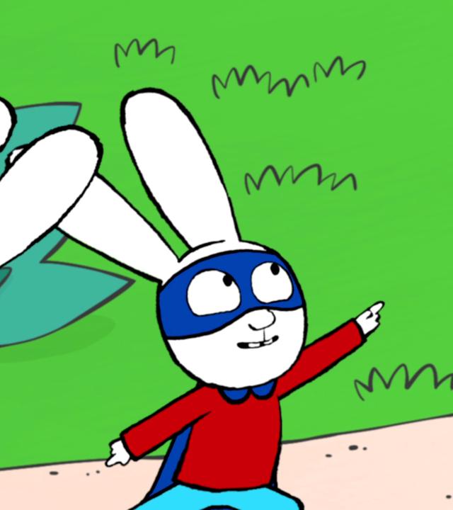 Ferdinand und Simon, als Superhelden verkleidet, posieren energiegeladen im Park.