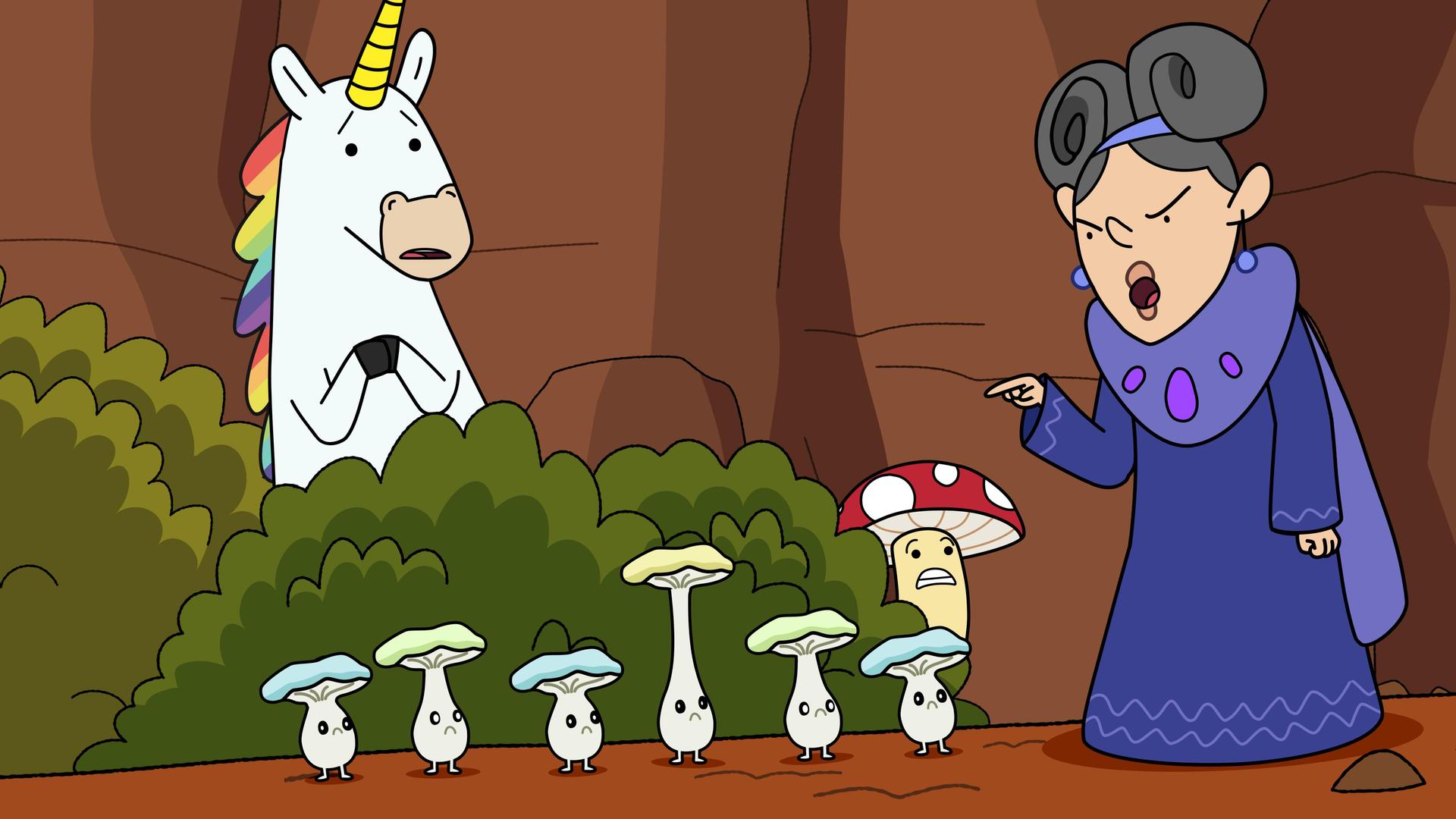 Vor einer Felswand stehen Blümchen und Tupfen hinter einem Busch und schauen entsetzt zu Lady Tamara, die energisch mit bösem Gesicht und erhobenem Zeigefinger zu einer Gruppe winzig-kleiner Pilze spricht.
