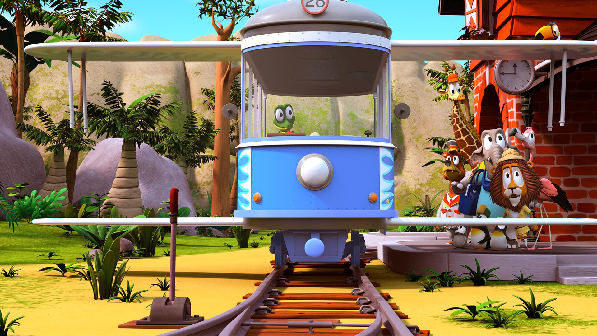 Krokodil Zacki sitzt allein in der Bahn, die sich in ein Flugzeug verwandelt hat und der Rest der Zoobande steht daneben und sieht sehr erstaunt aus.