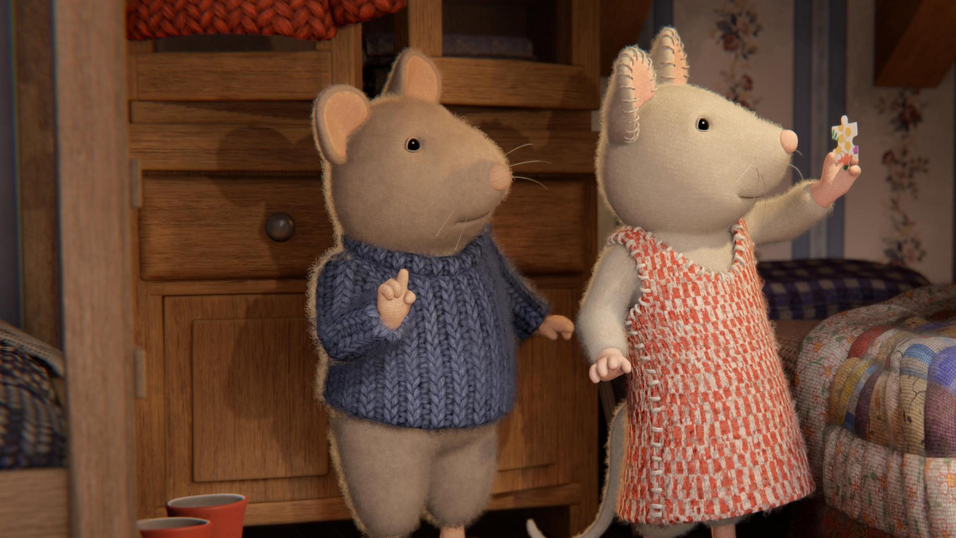 Sam und Julia stehen im Kinderzimmer neben Sams Bett. Julia hält ein Puzzleteil mit der linken Hand in die Höhe. Sie und Sam schauen verwundert darauf.