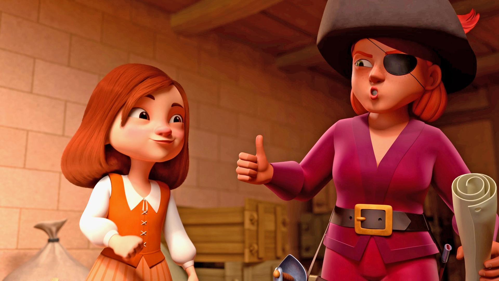 Charlotte steht lächelnd neben der Piratin Lily Rouge, die ihren rechten Daumen nach oben hält. In ihrer linken Hand hält die Piratin ein zusammengerolltes Papier.