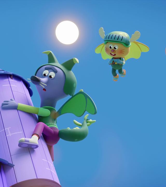 Wir sehen Wilf, den Wolf, in einem grünen Drachenkostüm mit Flügeln. Er hat sich mit beiden Händen an einen lilafarbenen Turm geklammert, der in den Himmel ragt. Am Himmel fliegen Ritterin Rebecca und Charly, verkleidet als Hofnarr. Es scheint, als müssten die beiden Wilf retten.