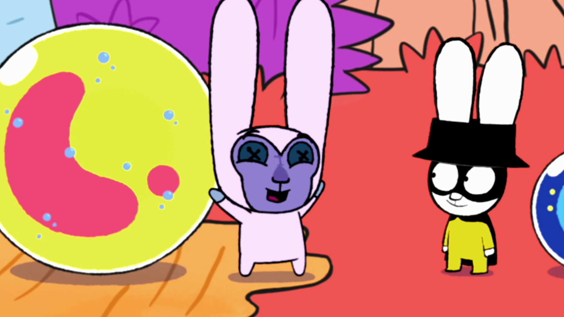 In der Fantasiewelt steht Roboter-Teddy Mega-Mini in einem Hasenkostüm verkleidet als Mega-Bo-Buddy fröhlich neben Captain Hase. Neben Mega-Mini liegt eine große gelb-rote Murmel. Captain Hase schaut interessiert zu Mega-Mini. Neben Captain Hase liegt eine kleinere blaue Murmel.