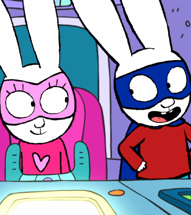 Super-Lou und Superhase befinden sich in Super-Ferdis Mega-Roboter. Super-Lou sitzt auf dem Steuersitz und schaut neugierig zu Superhase herüber. Vor Super-Lou befinden sich der Lenkhebel und das Bedienfeld des Roboters. Superhase schaut freudig auffordernd und mit offenem Mund zu Super-Lou herüber.