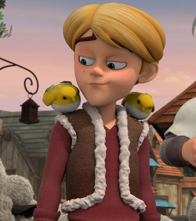 Prinz John läuft, flankiert von einem Wachmann, mit einer Schafherde durchs Dorf. Er selbst trägt statt seiner sonst königlichen Kleidung über seinem Pullover eine Schaffellweste. Auf seinen Schultern sitzen rechts und links Vögelchen. Zu dem auf seiner rechten Schulter blickt er.