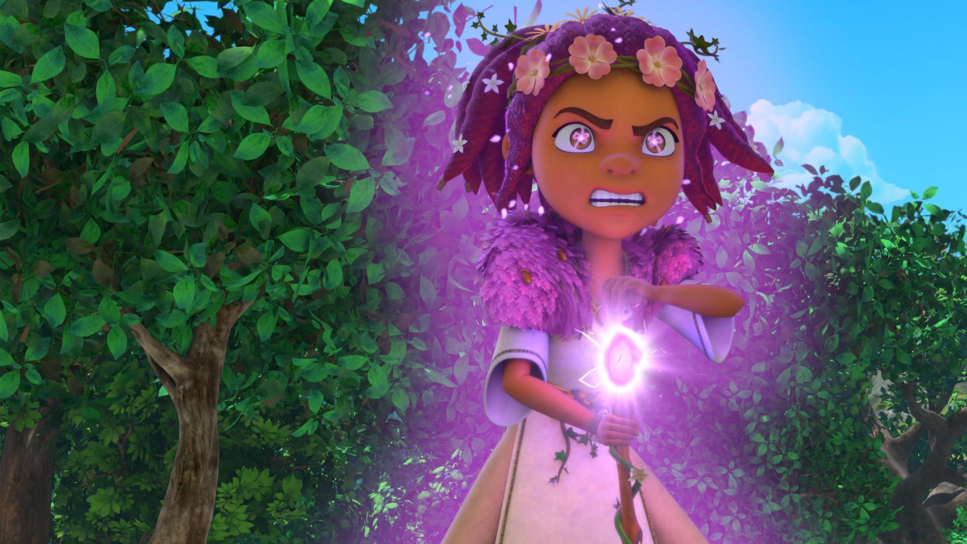  Druidin Katell steht im Wald. Sie sehr zornig nach vorne und hält ihren Druidenstab in der Hand. Der Smaragd ihres Stabs leuchtet lila auf. Auch ihre Augen blitzen lila vor Zorn. Um sie und ihre Gestalt glüht ein lilafarbenes Leuchten.