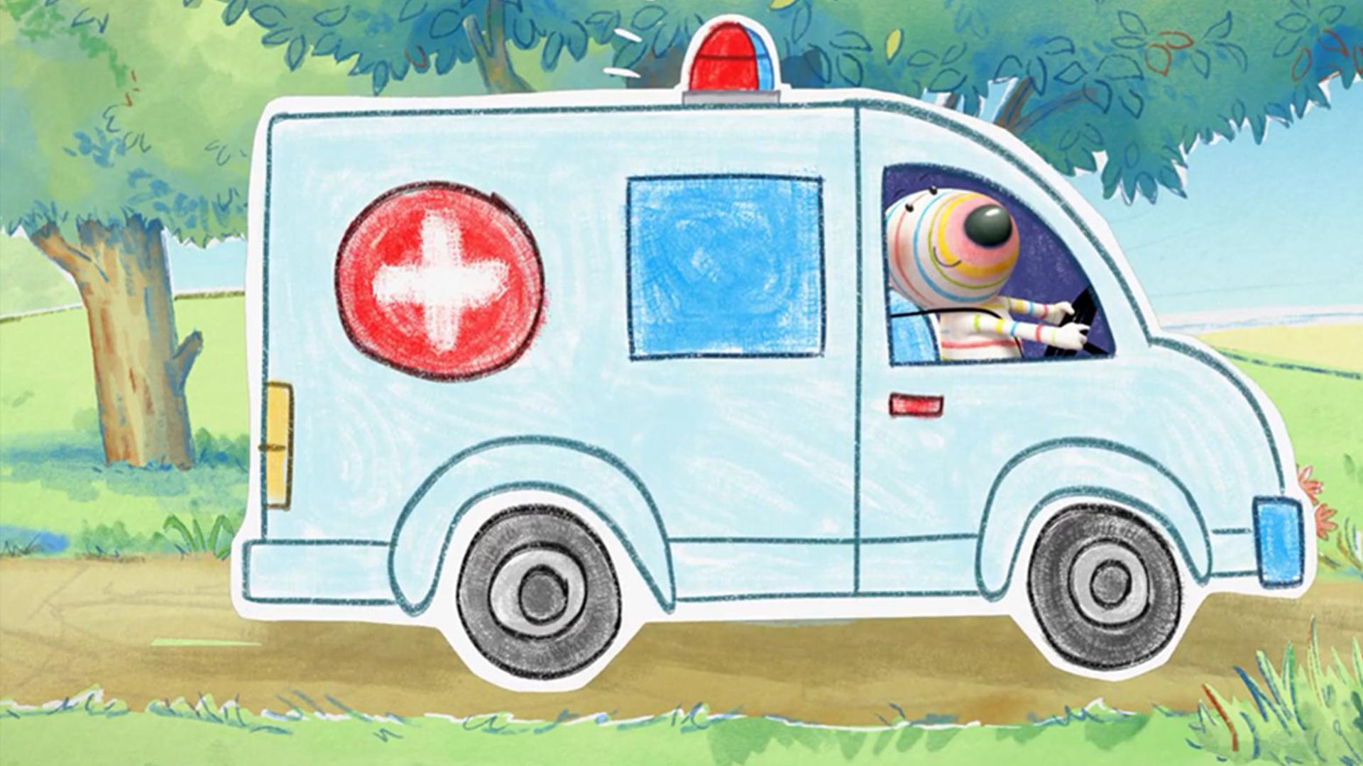 Hund Dylan sitzt in einem Rettungsfahrzeug, das er selbst lenkt. Das Fahrzeug fährt über einen Feldweg. Auf dem Dach leuchtet eine rote Sirene.