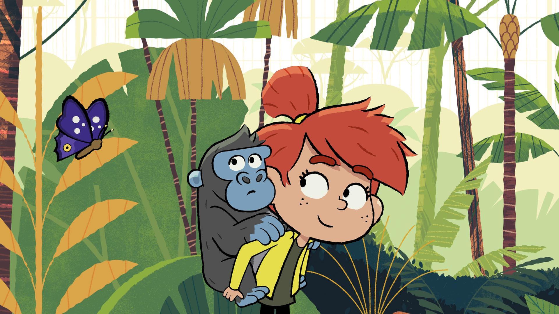 Taylor trägt das Gorilla-Baby auf dem Rücken. Es schaut neugierig zu einem Schmetterling.