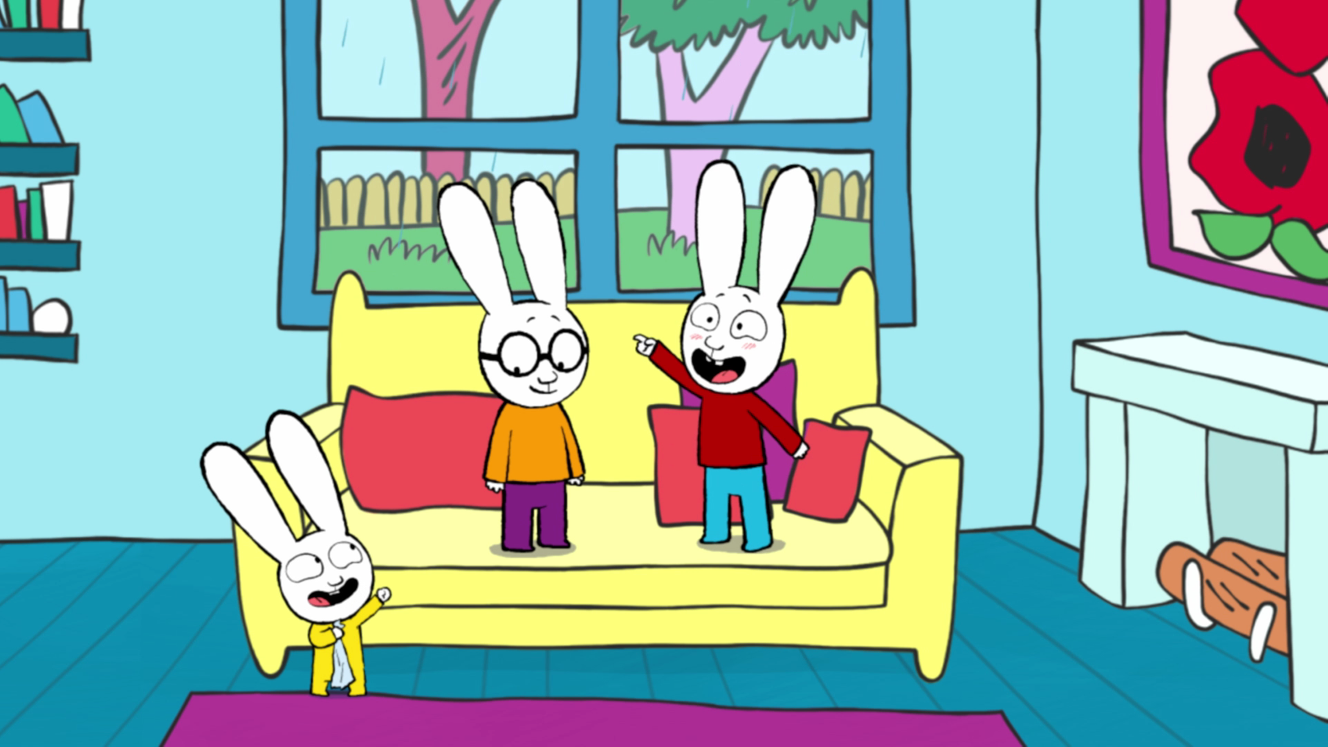 Im Wohnzimmer stehen Simon und Ferdinand auf dem Sofa. Simon hält ein rotes Blatt Papier in der Hand. Franz steht vor dem Sofa und schaut aufmerksam zu Simon hoch und jubelt freudig. Rechts an der Wand steht ein Kamin über dem eine Bild mit einer Blume hängt.