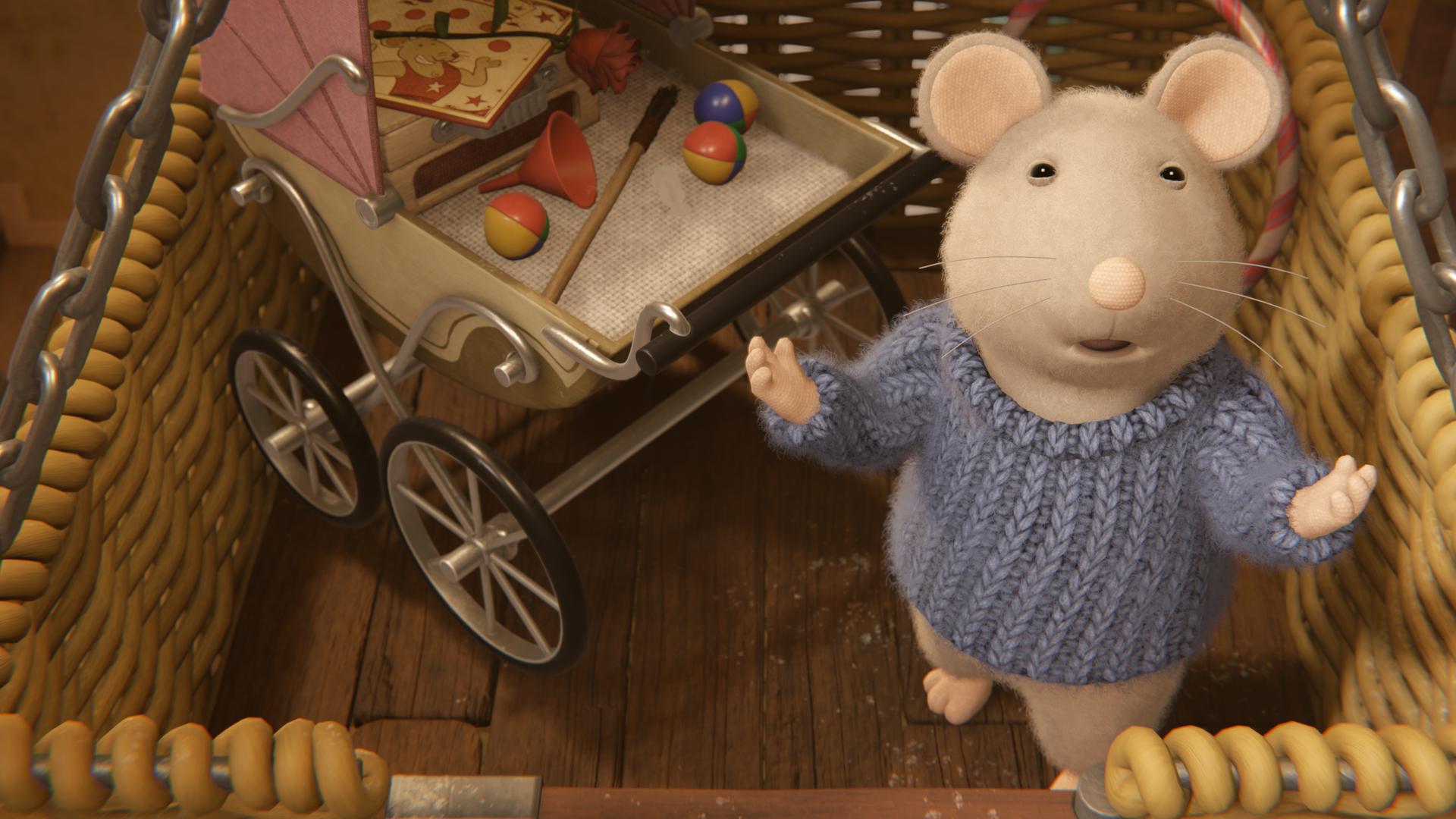 Sam steht in einem großen Korb mit einem Kinderwagen voller Zauberartikel und breitet die Arme aus, um seine Vorstellung zu beginnen.