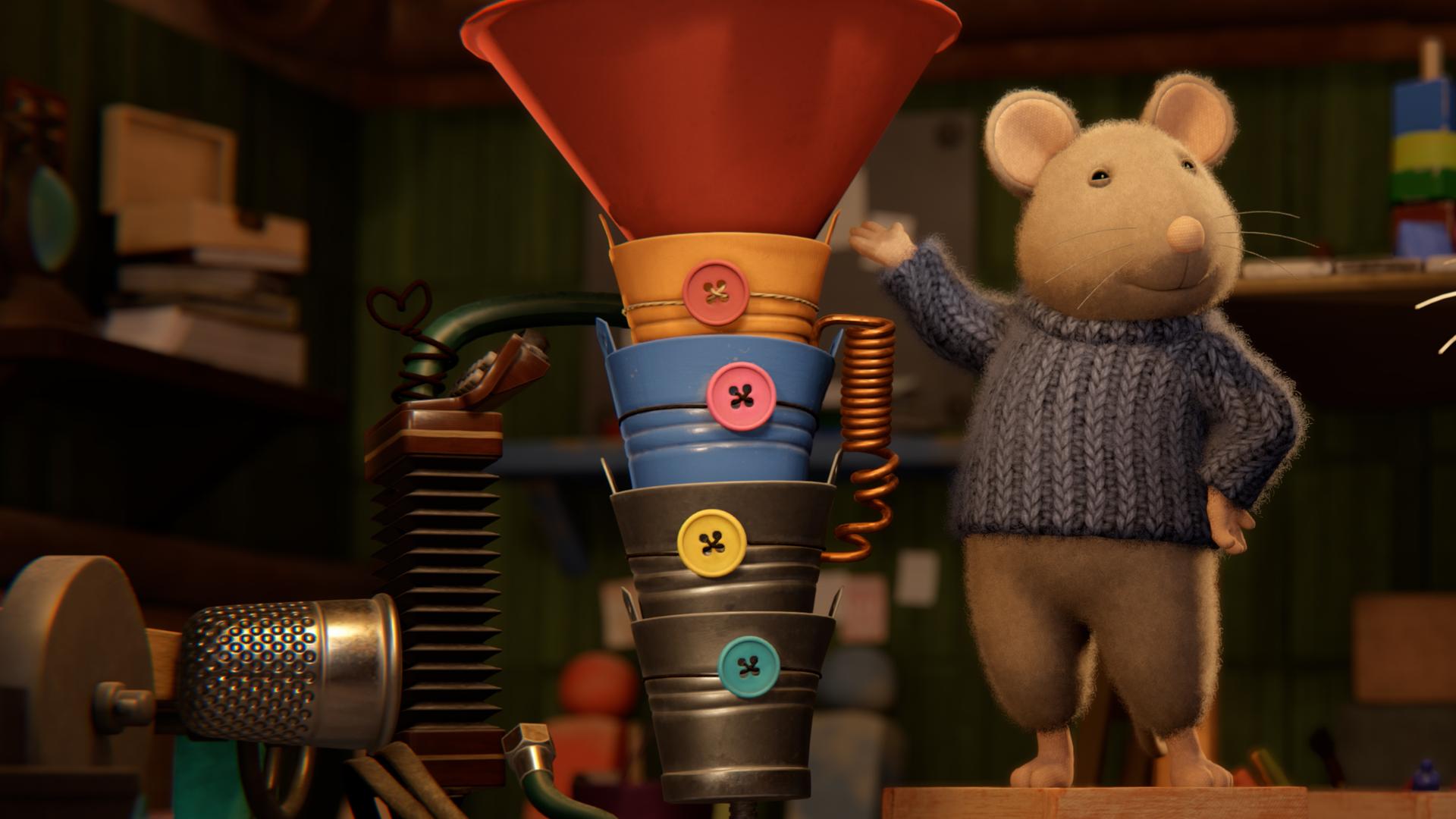 Sam steht neben einem für Julia selbtgebastelten Musikinstrument und präsentiert es stolz. Es besteht aus bunten, ineinandergefügten Eimern und einem großen, roten Trichter obenauf und sieht aus wie eine Riesen-Tuba.