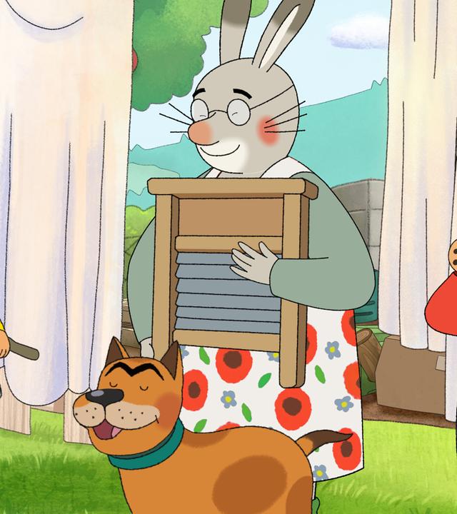 Karlchens Oma streicht mit der Hand über ein altes Waschbrett. Vor ihr steht Bello, der Hund und scheint zu singen. Karlchen bläst auf dem Ausguss einer Gießkanne, Monika trommelt mit einem Stöckchen auf einer Blechdose.