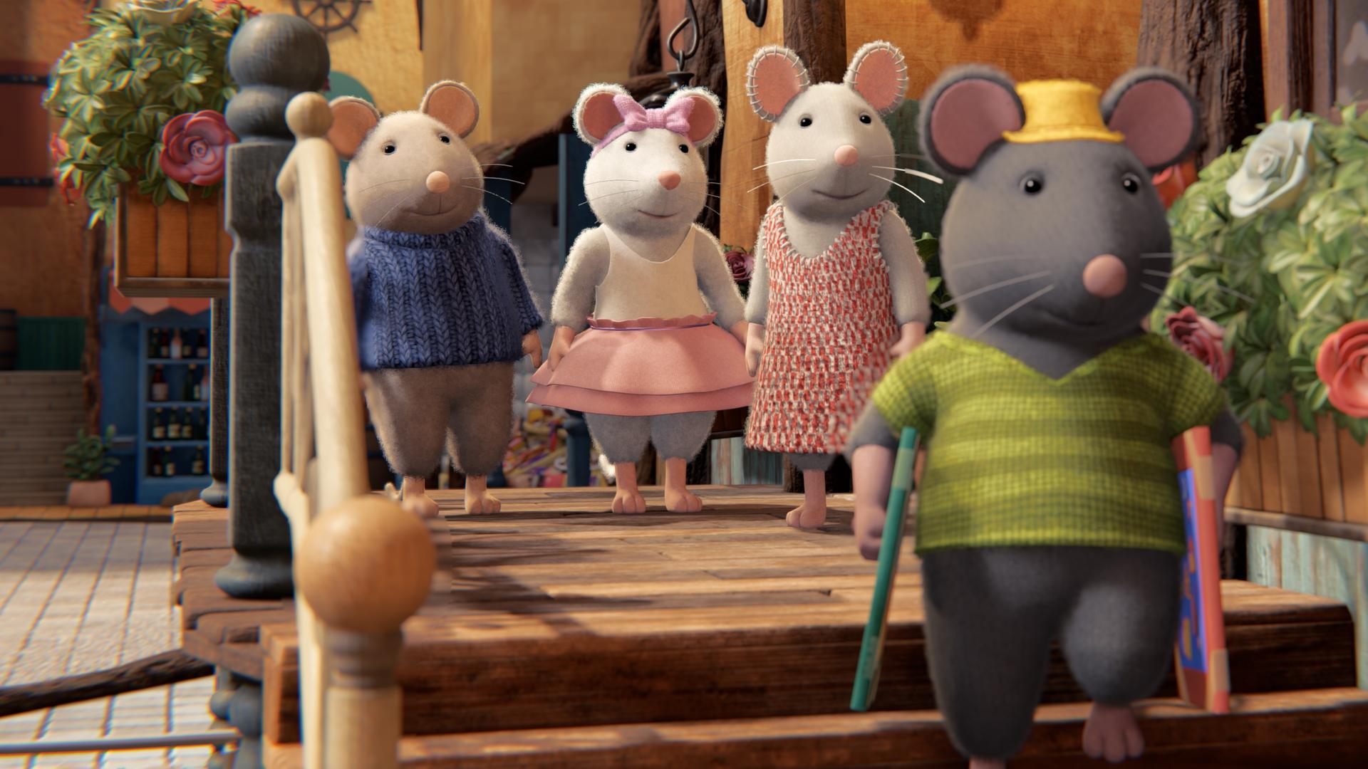 Sam, Ella und Julia stehen draußen auf einem Treppenabsatz und schauen Tonio nach, der mit zwei Bildern unter den Armen die Treppe hinunterläuft.