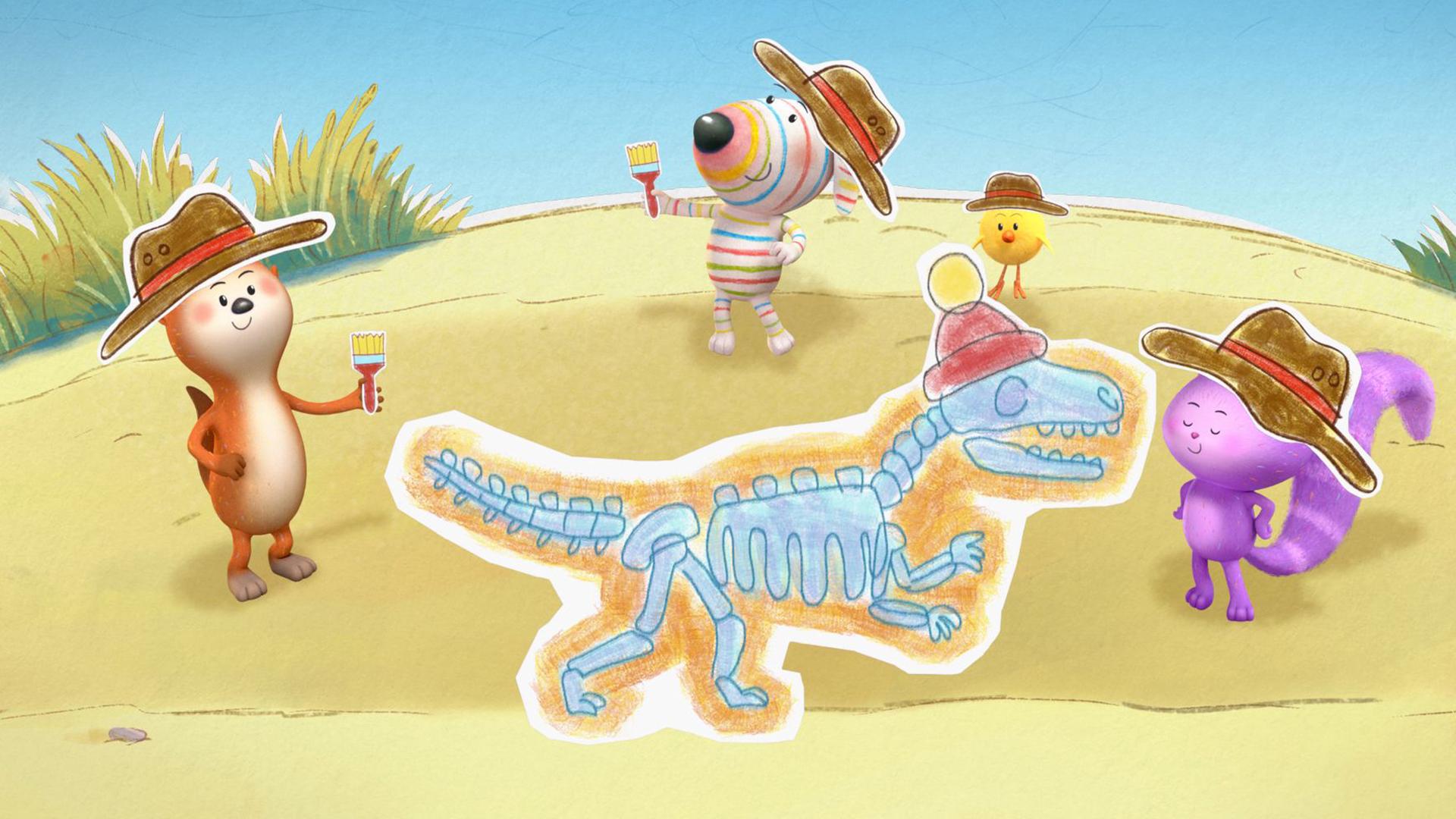Otter Ozzy, Hund Dylan, Küken Bitsy und Katze Daisy stehen auf einem Sandhügel um ein ausgegrabenes Dinosaurierskelett herum. Jeder von ihnen trägt einen breiten braunen Hut auf dem Kopf. Dylan und Ozzy halten jeweils einen Pinsel in den Pfoten, mit dem sie das Skelett freigelegt haben. Das Skelett trägt Ozzys rote Pudelmütze auf dem Kopf.