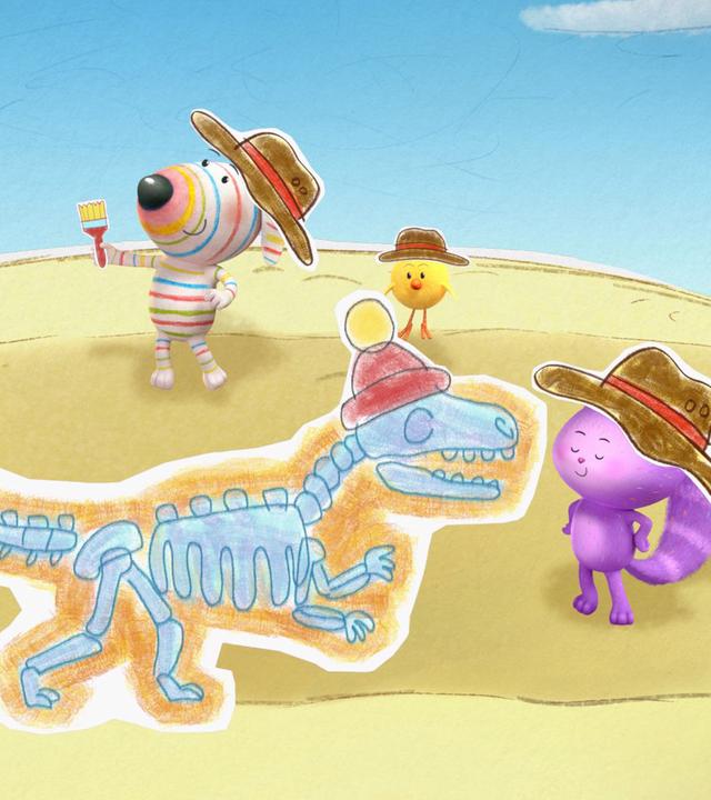 Otter Ozzy, Hund Dylan, Küken Bitsy und Katze Daisy stehen auf einem Sandhügel um ein ausgegrabenes Dinosaurierskelett herum. Jeder von ihnen trägt einen breiten braunen Hut auf dem Kopf. Dylan und Ozzy halten jeweils einen Pinsel in den Pfoten, mit dem sie das Skelett freigelegt haben. Das Skelett trägt Ozzys rote Pudelmütze auf dem Kopf.