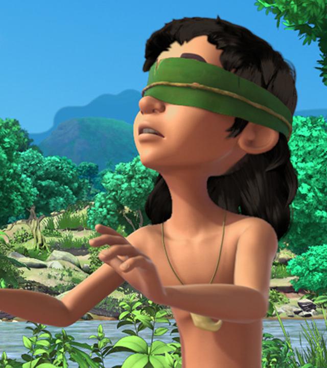 Mogli ist vorübergehend blind. Er trägt eine Augenbinde und hebt beide Arme nach oben.