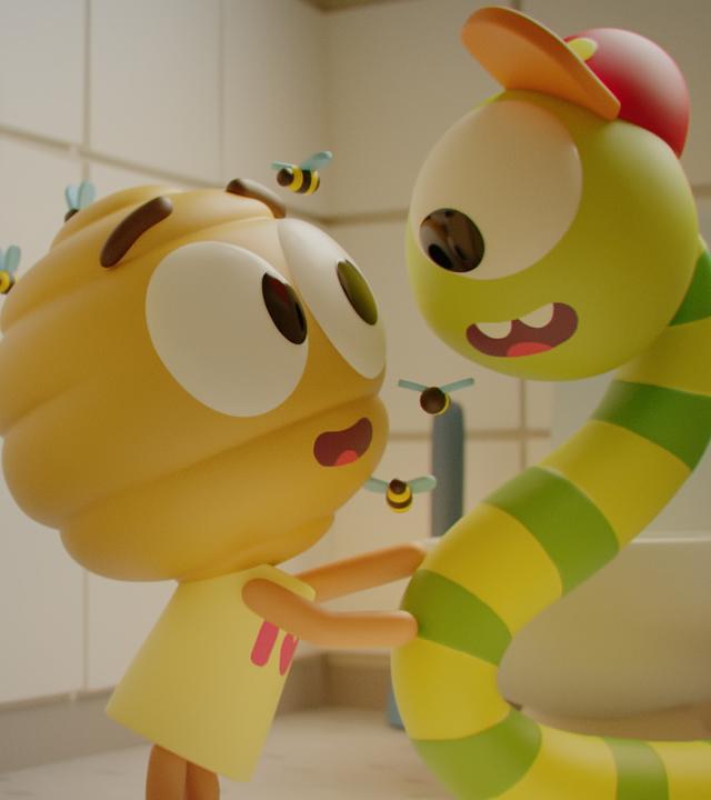 Bienenstock-Mädchen Flora steht in einer Kabine der Schultoilette und versucht Wurm Glitsch zu umarmen. Sie schmachtet ihn verliebt an und auch Glitsch blickt fröhlich zu Flora. Vor der Kabinentür steht das Küken Karla und betrachtet das Geschehen.