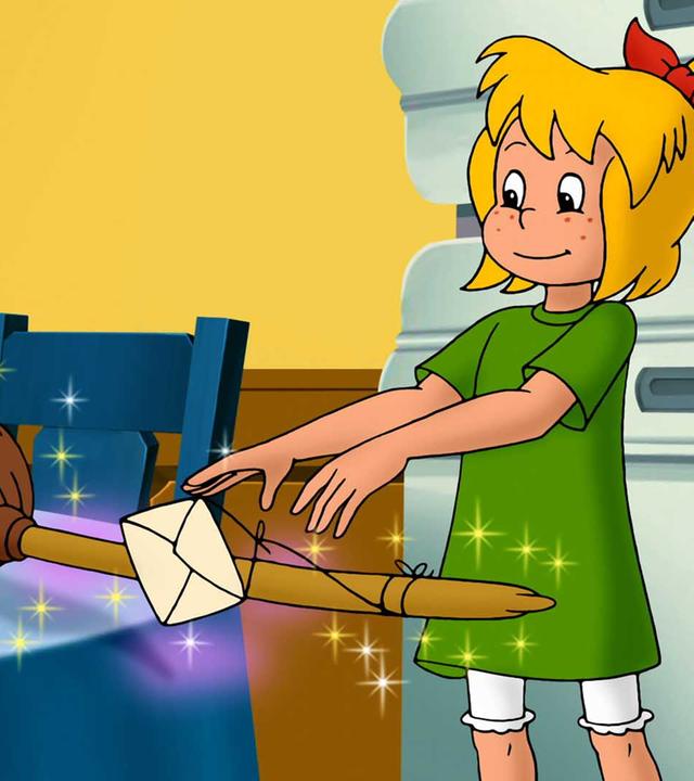 Bibi steht in ihrer Küche neben ihrem Besen Kartoffelbrei