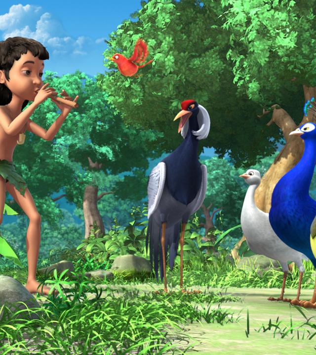 Vor Mogli stehen Rangu, Pula, Pavo und Aliona im Halbkreis.