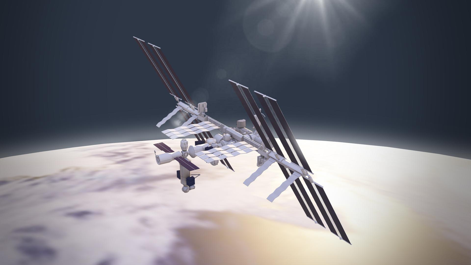 Das 3D-Modell der ISS schwebt über dem Erdball. 
