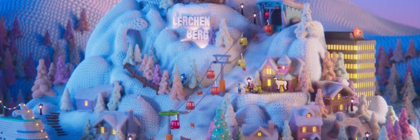 Aus dem Weihnachtsgrüße-Trailer des ZDF: Animation mit gestricktem "Lerchenberg" als Winterlandschaft