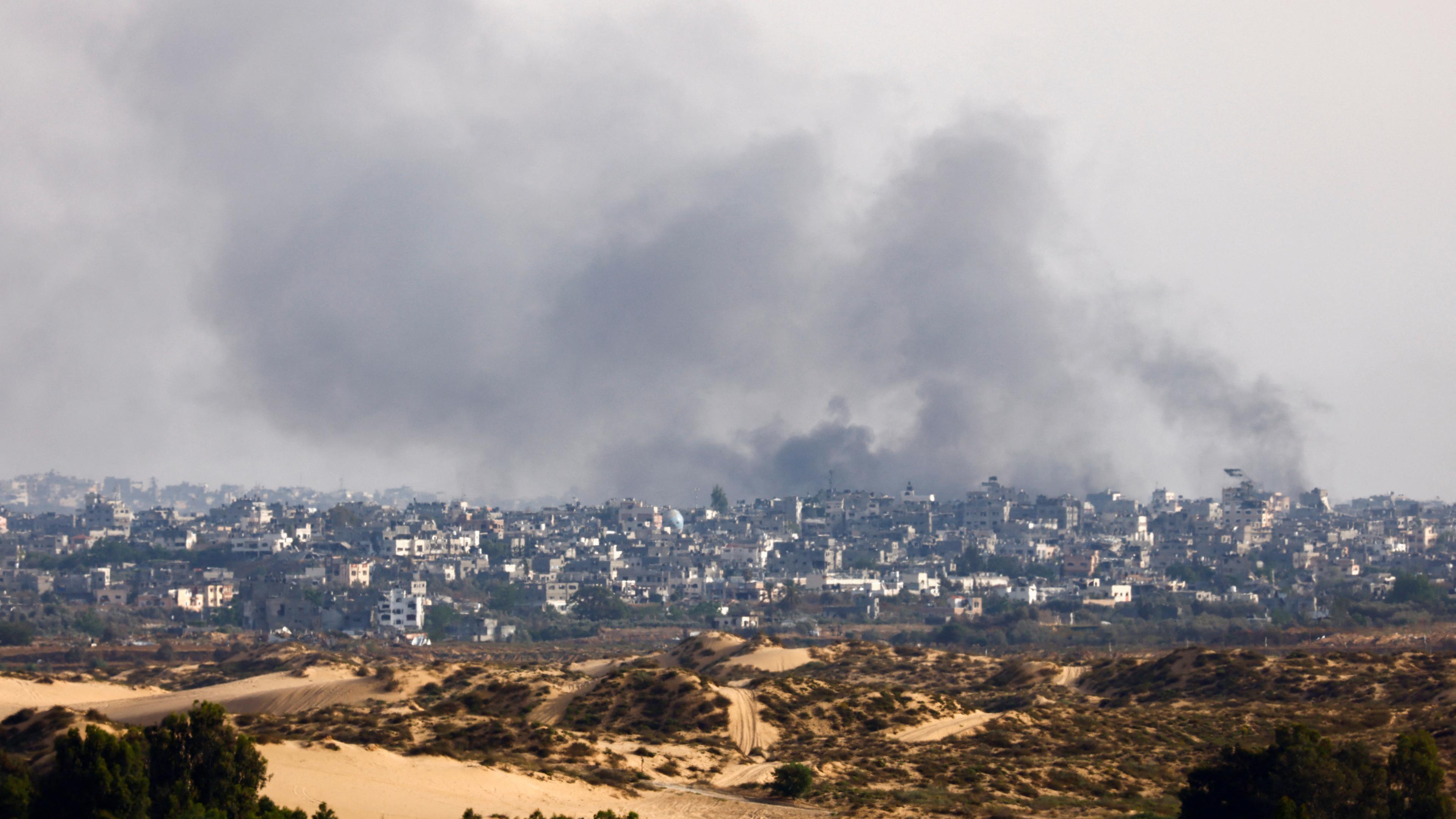 Smoke rises following an Israeli airstrike in Gaza near the Israel-Gaza border