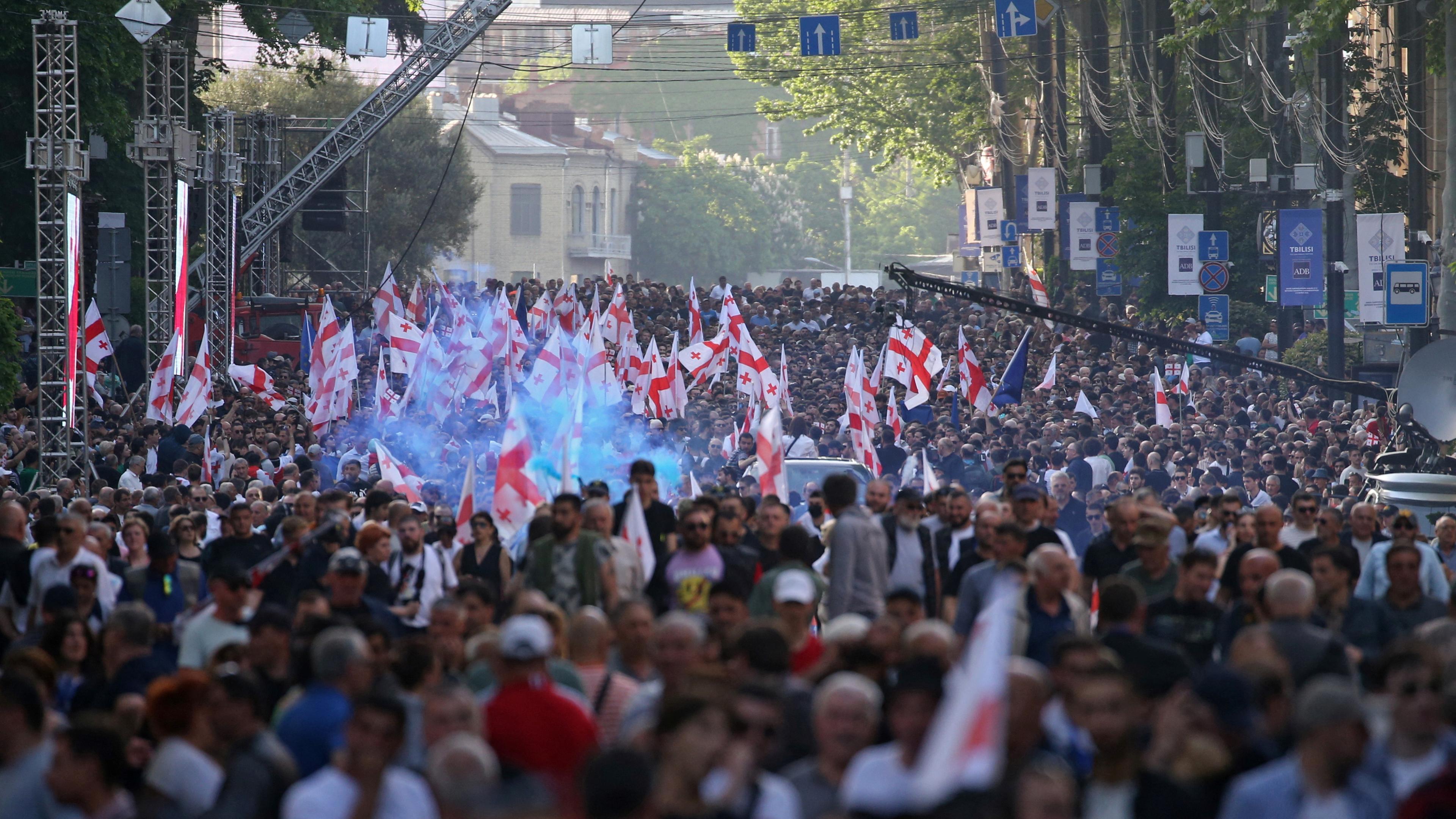 People take part in a pro-government rally in support of a bill on "foreign agents" in Tbilisi, Georgia April 29, 2024.