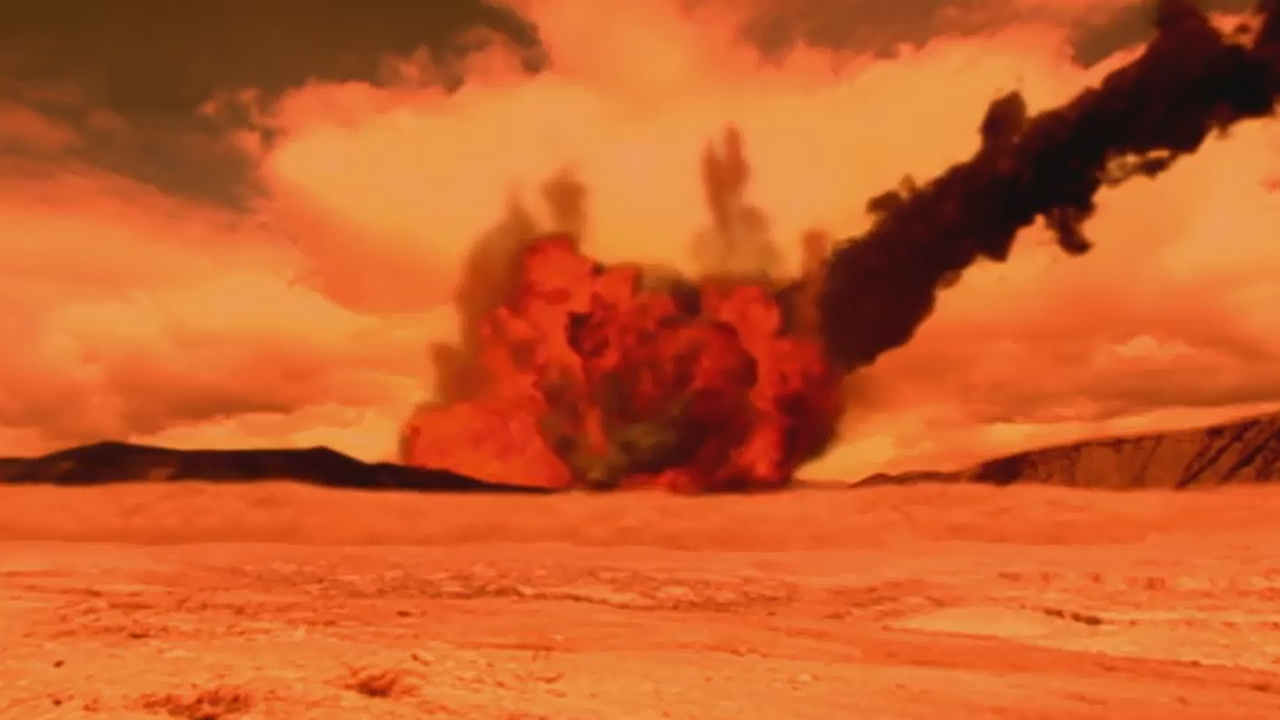 Ein Meteorit schlägt auf die Erde ein. Es ist sehr dunkel und leuchtet rot.