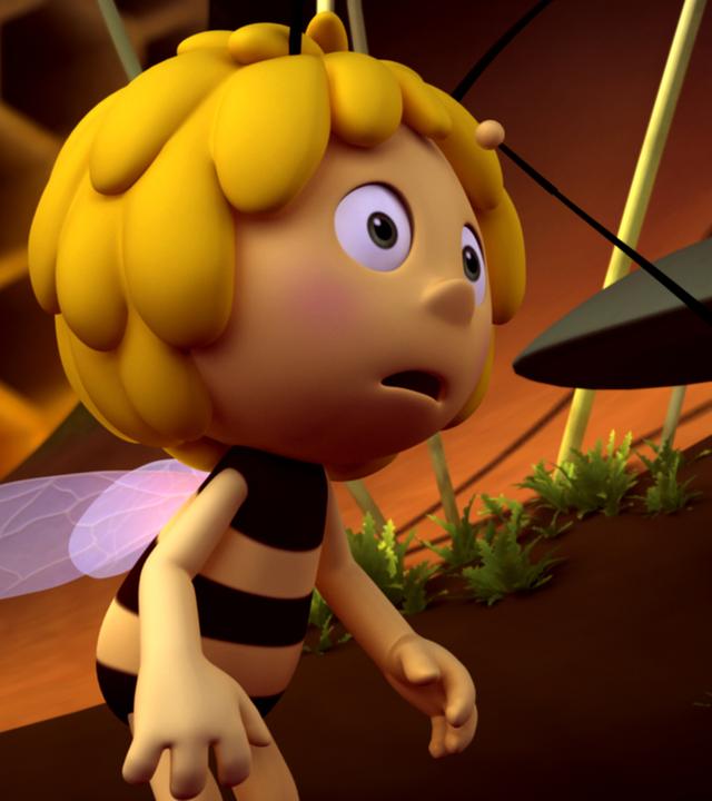 Willi (rechts) hat Mund und Augen vor Schreck weit aufgerissen. Maja (links) steht neben ihm und schaut verdutzt.