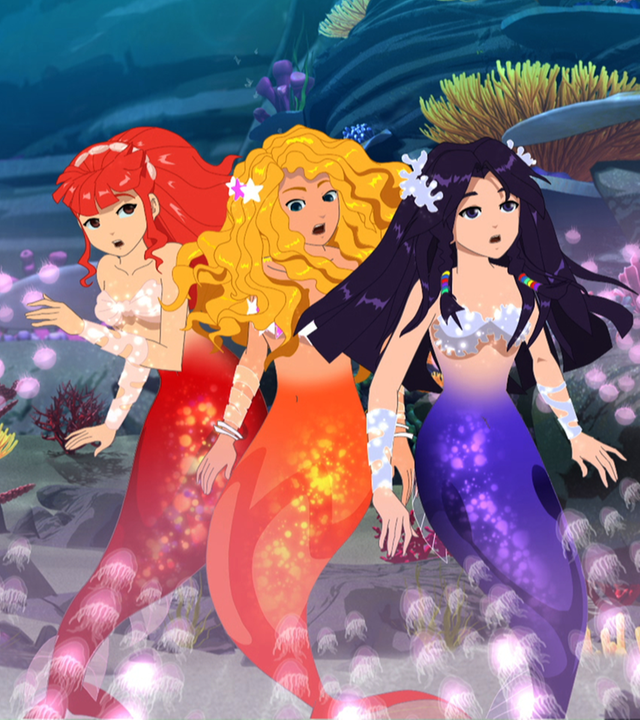 Die Meerjungfrauen Cleo, Emma und Rikki sind von giftigen Quallen umstellt.