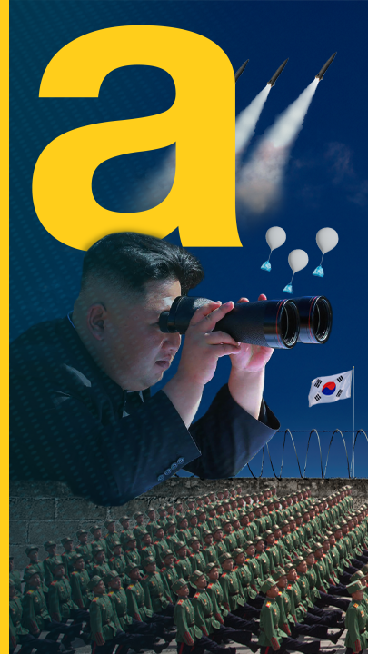 Nordkoreas Diktator Kim Jong-un beobachtet mir Fernglas seine Soldaten, während Raketen und Müll-Ballons über die Grenze fliegen