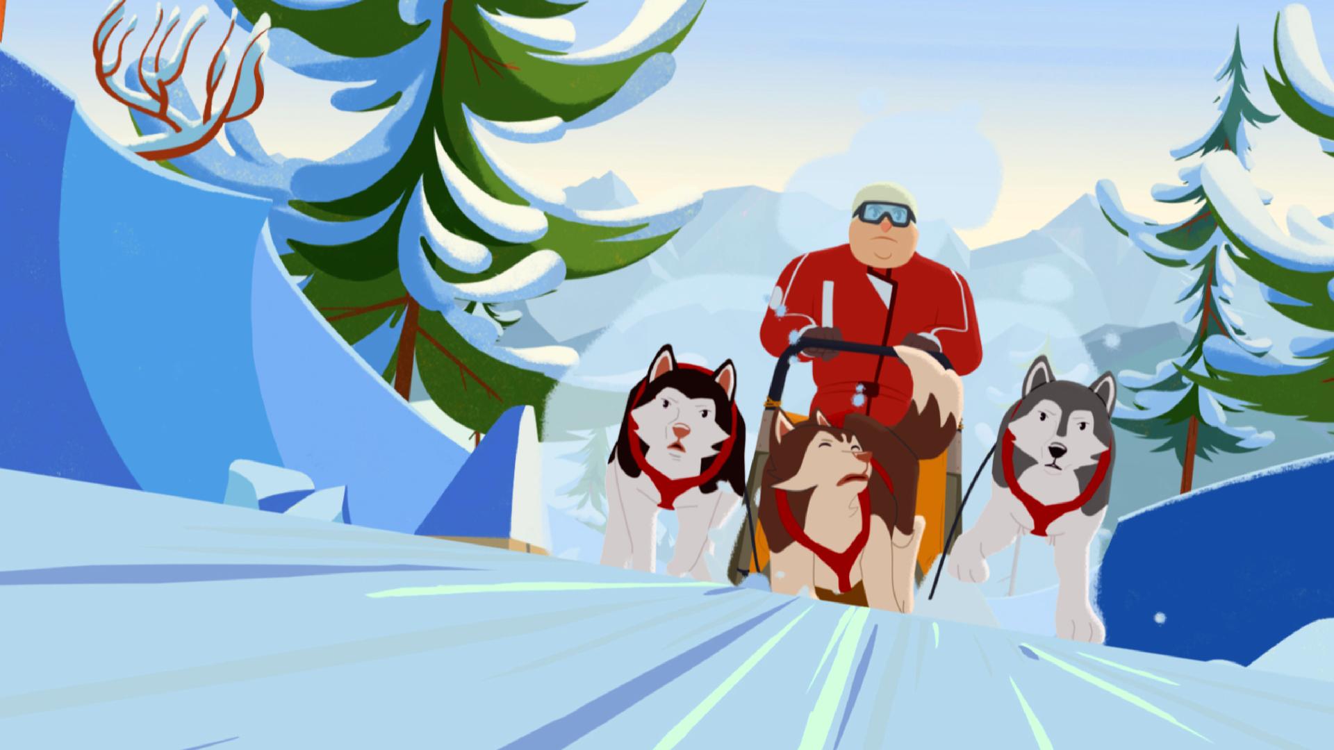 Gabriel lässt sich auf seinem Schlitten von drei Hunden ziehen. Der mittlere scheint gleich zu stürzen.