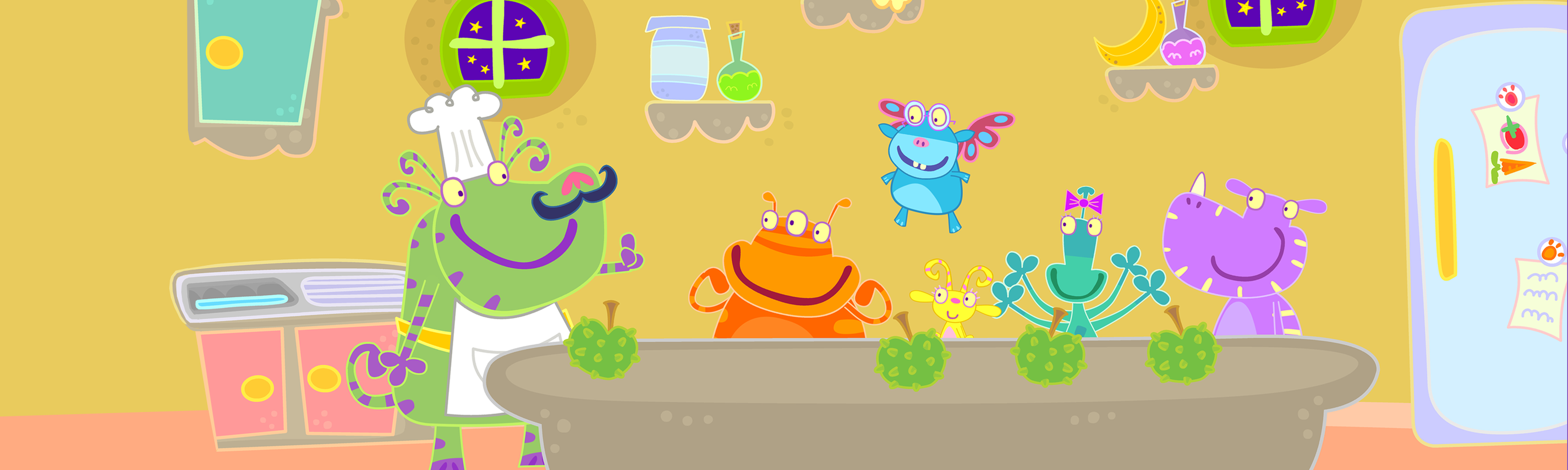 In einer Küche steht Herr Butternuss (links) mit Jamjam, Flügelchen, Winzelschön, Piepa und Schnuffelplumps an einem Tisch, auf dem viele Äpfel liegen. 