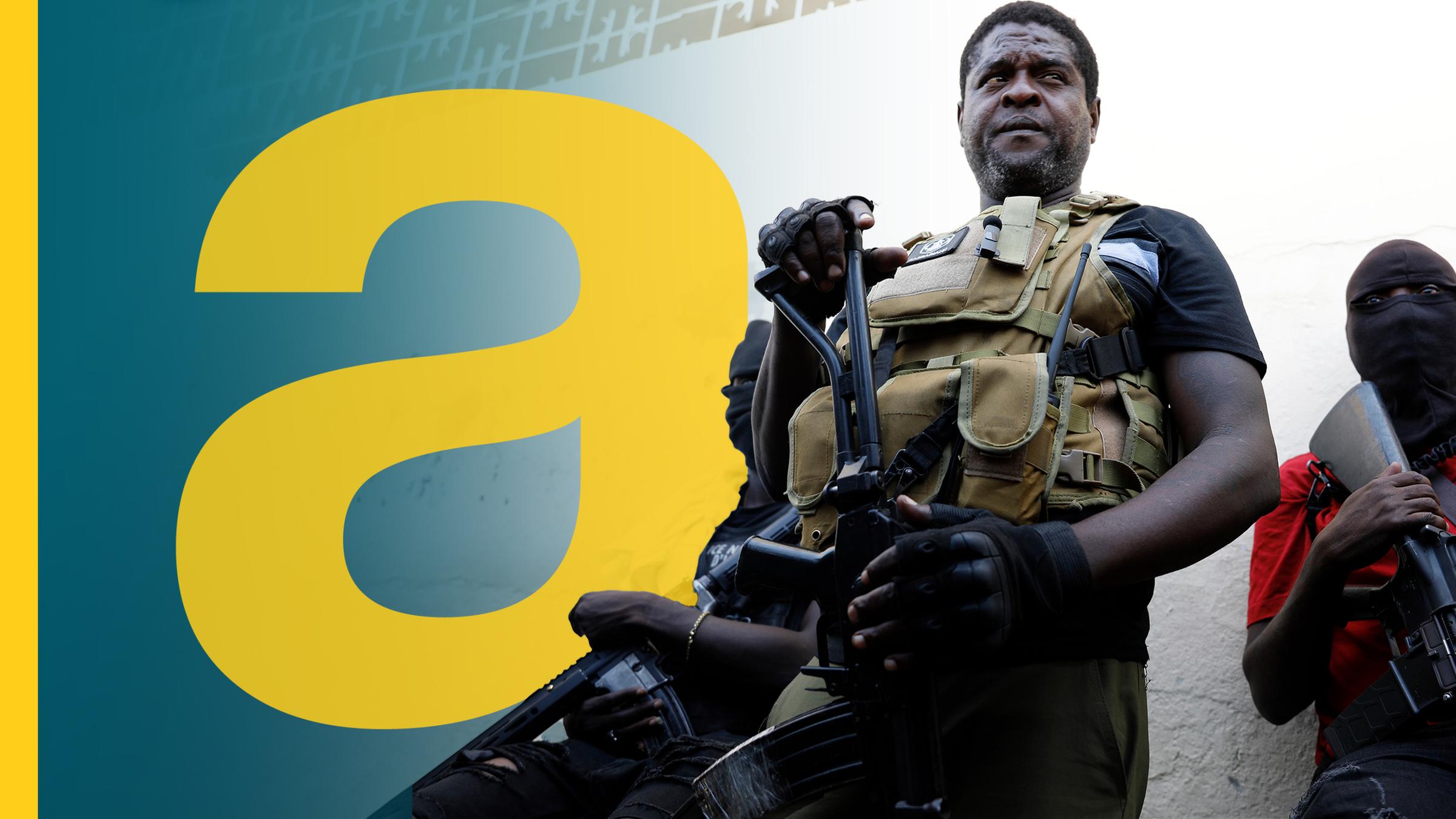 Mann mit Schutzweste und Waffe auf Haiti