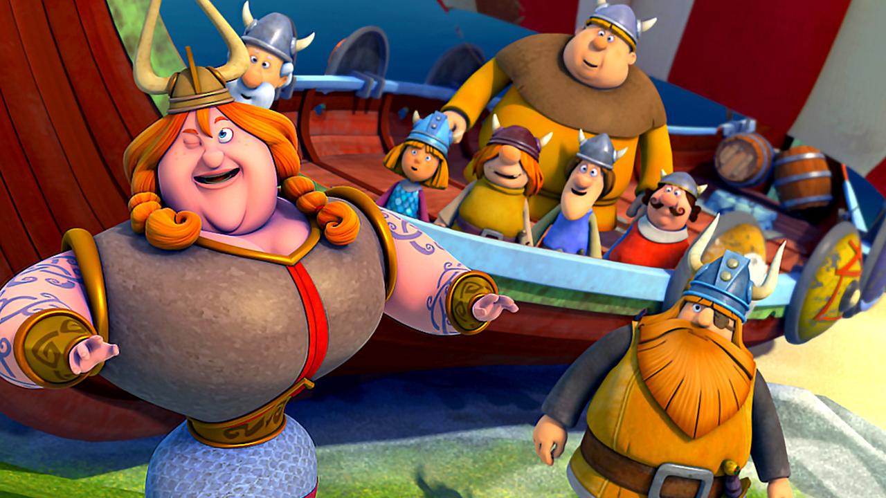 Halvar steht mit der Königin vor dem Schiff der Wikinger. Auf dem Schiff stehen die Männer von Halvar, die überrascht aussehen.