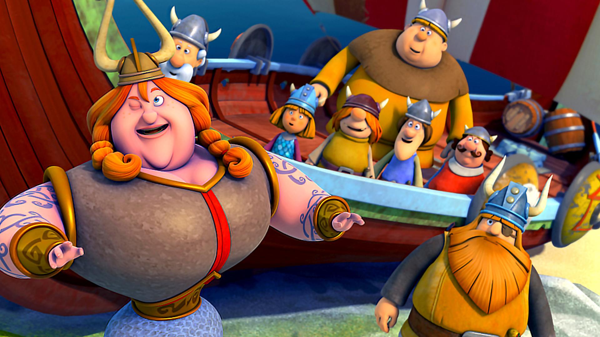 Halvar steht mit der Königin vor dem Schiff der Wikinger. Auf dem Schiff stehen die Männer von Halvar, die überrascht aussehen.