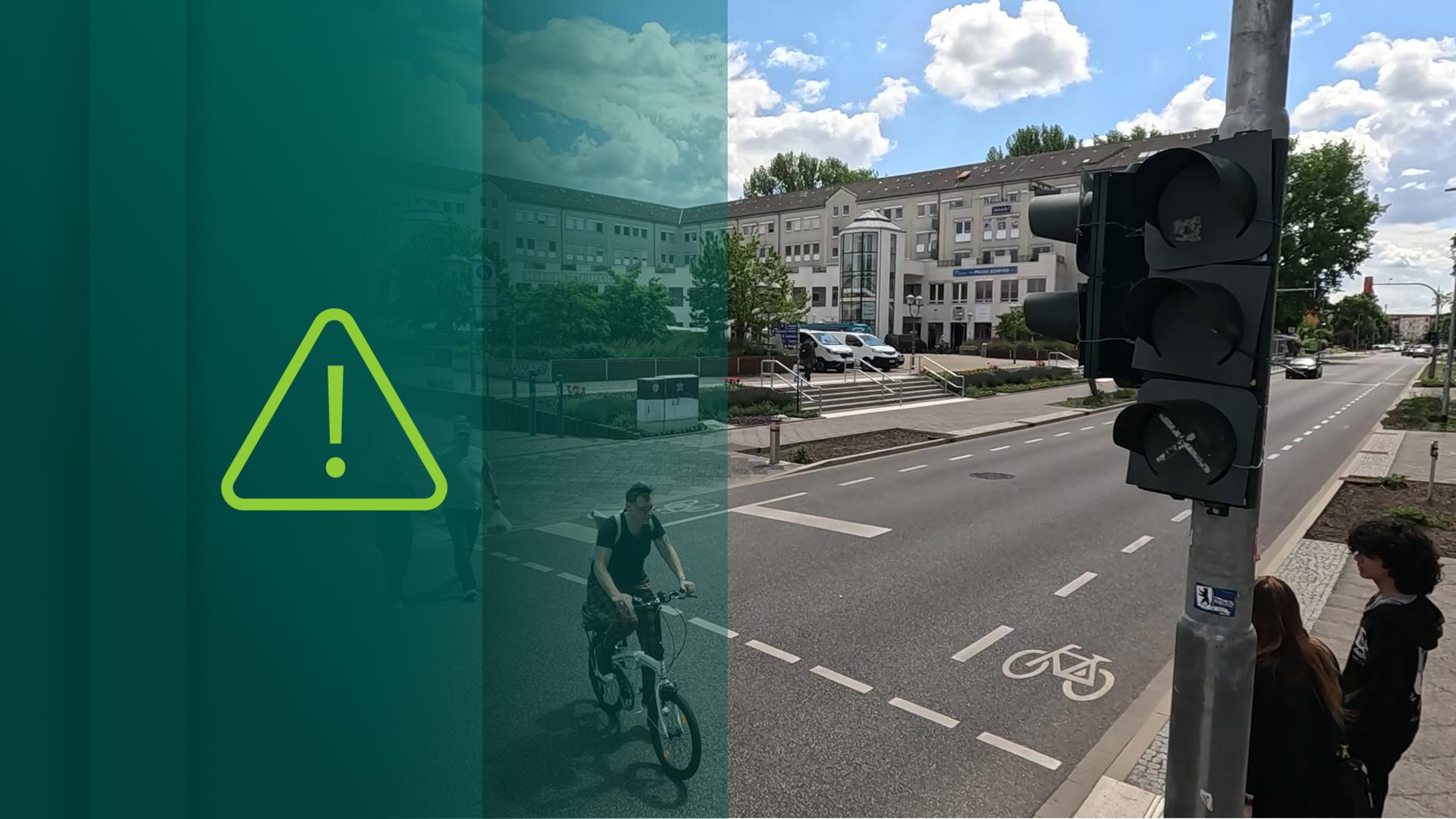 Eine Straße in Hennigsdorf, rechts eine abgeschaltete Ampel, ein Fahrradfahrer überquert die Straße.