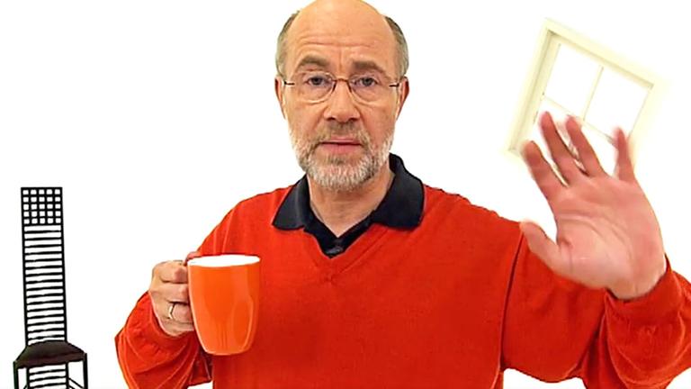 Professeor Harald Lesch mit Kaffeetasse