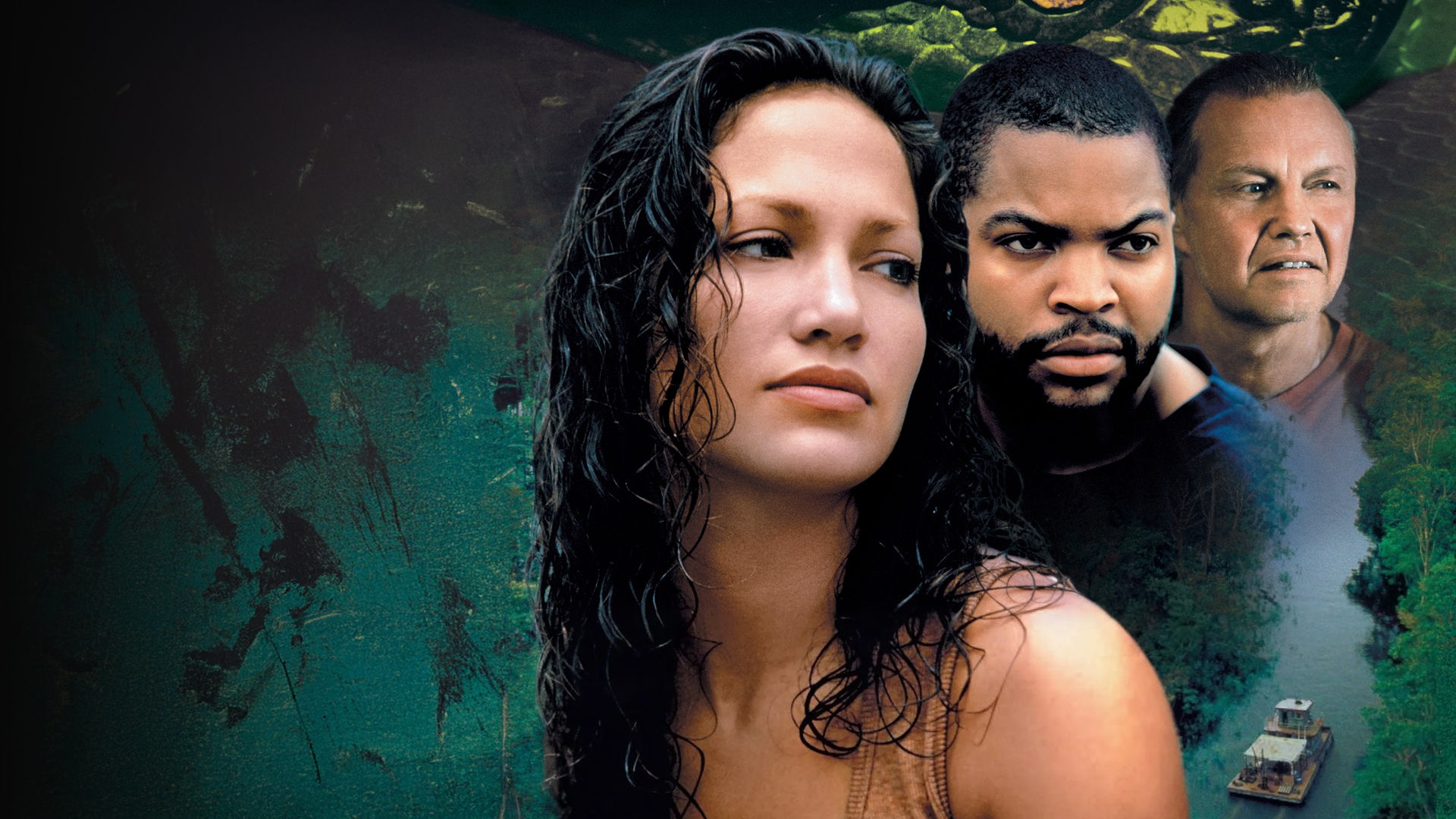 Das Filmplakat zu „Anaconda“ zeigt im Vordergrund die drei Hauptcharaktere Terri Flores (Jennifer Lopez), Danny Rich (Ice Cube) und Paul Serone (Jon Voight) vor einer dichten, grünen Dschungellandschaft mit einem kleinen Boot auf einem Fluss. Über den Köpfen der Schauspieler ist die riesige, gelb-grüne Haut einer Schlange zu sehen, die bedrohlich über der Szenerie liegt.