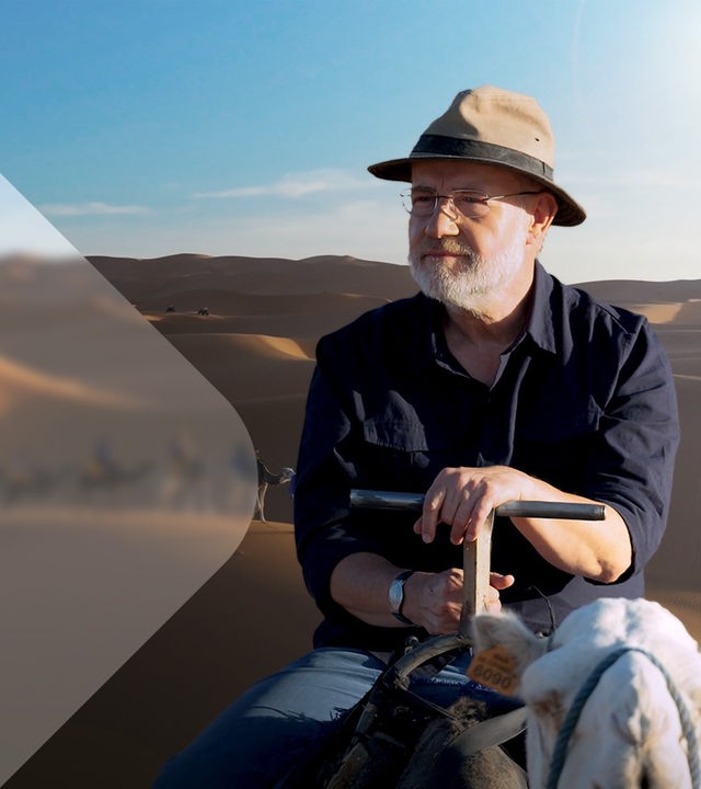 Harald Lesch vor Wüstenlandschaft (Collage)